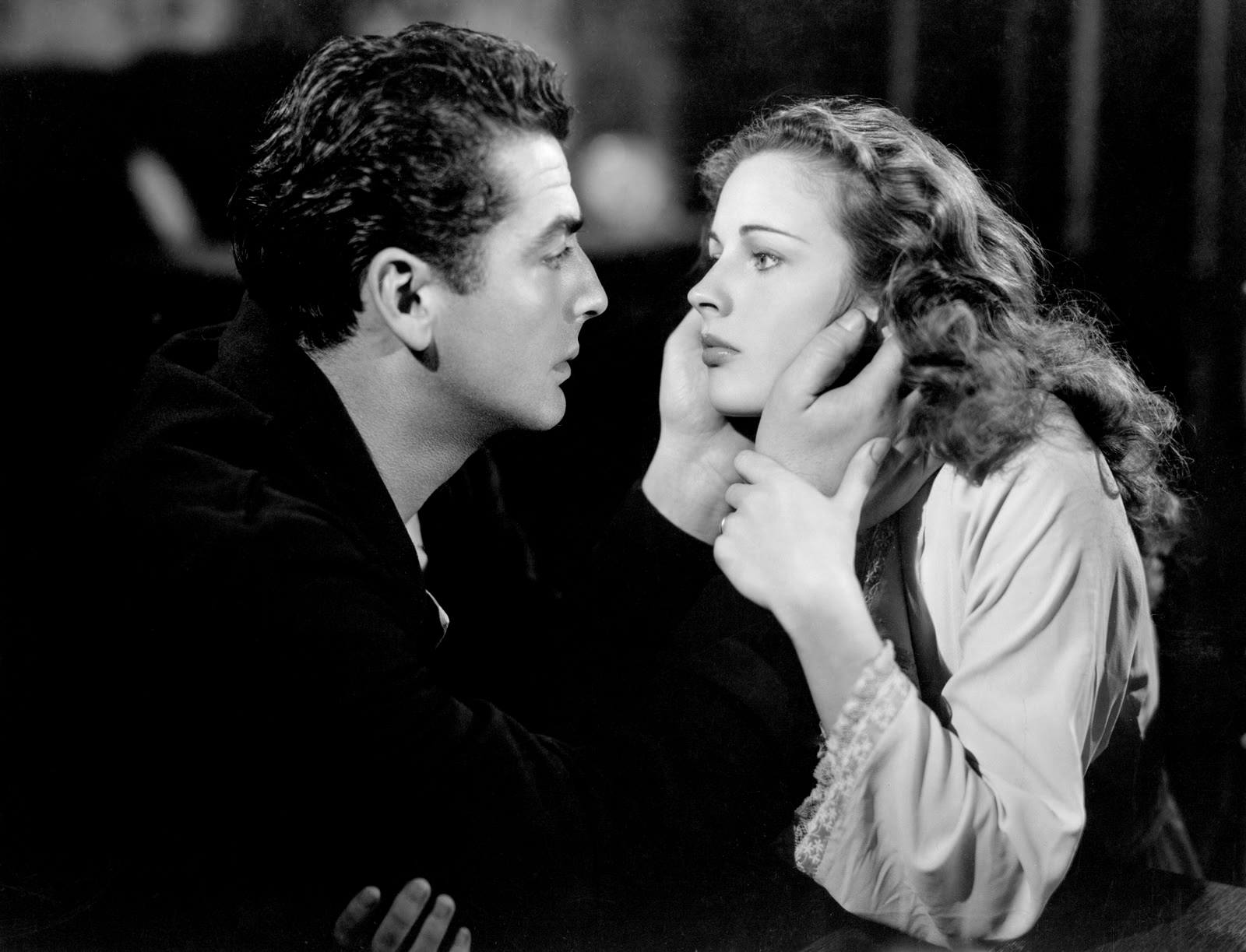 Victor Mature caresses lovely Coleen Gray.