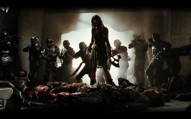 Well-armed Summer Glau (as River Tam) is surrounded by Alliance troops after dispatching an infestation of cannibalistic Reavers.