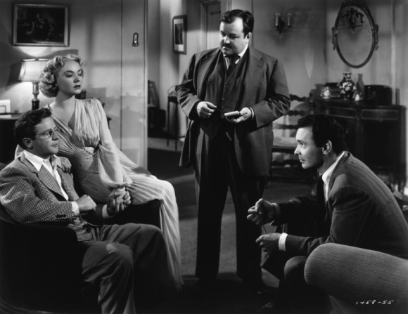 Richard Basehart and Audrey Totter face off against police lieutenants Edgar Gonsales (William Conrad) and Collier Bonnabel (Barry Sullivan).